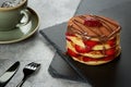Tasty pancake with chocolate and fresh strawberries slices Royalty Free Stock Photo