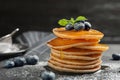 Tasty pancakes with berries and honey