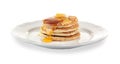 Tasty pancakes with honey and butter on plate Royalty Free Stock Photo