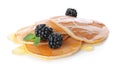 Tasty pancakes with maple syrup and fresh berries Royalty Free Stock Photo