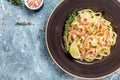 Tasty pasta with shrimps, Italian pasta fettuccine with grilled shrimps, bechamel sauce and thyme, banner, menu recipe place for Royalty Free Stock Photo