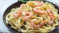 Tasty pasta with shrimps, Italian pasta fettuccine with grilled shrimps, bechamel sauce and thyme, Italian food, top view Royalty Free Stock Photo