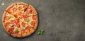 Tasty pepperoni pizza with basil on brown concrete background. Top view of hot pepperoni pizza. With copy space for text. Flat lay