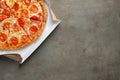 Tasty pepperoni pizza in a box. Top view Royalty Free Stock Photo