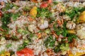 Tasty pilaf with carrot, garlic, bell pepper and meat