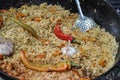 Tasty pilaf close-up in cauldron