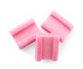 Tasty pink chewing gums on white background, top view Royalty Free Stock Photo