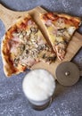 Tasty pizza and glass of beer on  table Royalty Free Stock Photo