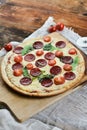 Tasty Pizza With Tomato Sauce, Pepperoni Sausage, And Mushrooms On Wooden Background Natural Rustic, A Pizza Cutter And Ingridient Royalty Free Stock Photo