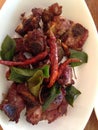 Tasty pork barbeque with kaffir leaves and chilli pepp