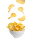 Tasty potato chips falling into blow