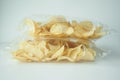 tasty potato chips in a packet on white background Royalty Free Stock Photo