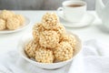 Tasty puffed rice balls in bowl on table, closeup Royalty Free Stock Photo