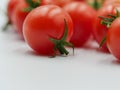 Tasty red cherry tomatoes with shadows Royalty Free Stock Photo