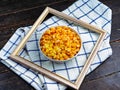 Tasty ripe corn kernels in a bowl. Royalty Free Stock Photo