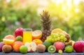 Tasty ripe fruits and a glass of juice on a wooden table Royalty Free Stock Photo