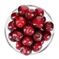 Tasty ripe red cherries in glass bowl isolated, top view Royalty Free Stock Photo