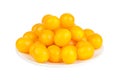 Tasty ripe yellow tomatoes on white plate on white background Royalty Free Stock Photo