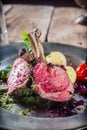 Tasty rustic dinner of lamb cutlets and salad Royalty Free Stock Photo