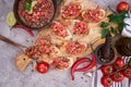 tasty salsa bruschetta snacks at domestic kitchen on wooden cutting board