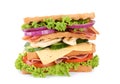Tasty sandwich with chicken, ham and bacon isolated on white Royalty Free Stock Photo