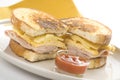 Tasty sandwich of ham and cheese omelet Royalty Free Stock Photo