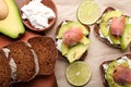 Tasty sandwiches with avocado and fish