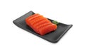 Tasty sashimi (slices of raw salmon) served with parsley isolated on white