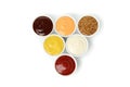 Tasty sauces in bowls isolated on background