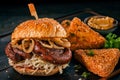 Tasty burger with sausage and onion Royalty Free Stock Photo