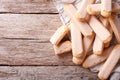 Tasty Savoiardi cookies on the table. horizontal top view