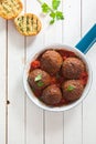 Tasty savory ground beef meatballs in tomato sauce