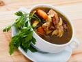 Tasty scottish traditional soup cock-a-leekie with chicken, bacon and leek