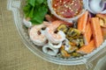 Tasty seafood salad such as shrimp, squid, mussels, fresh vegetable in box Royalty Free Stock Photo