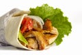 Tasty shawarma sandwich on a white background