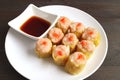 Shrimp and Pork Filled Chinese Steamed Dumplings Called Shumai on a White Plate Royalty Free Stock Photo