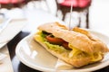 Tasty skewer pierced long ciabatta sandwich Royalty Free Stock Photo