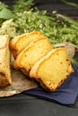 Tasty Sliced Home Baked Bread on Wooden Background