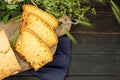 Tasty Sliced Home Baked Bread on Wooden Background