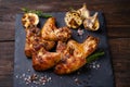 Tasty spiced grilled chicken wings. Beer snack Royalty Free Stock Photo