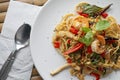 Tasty Spicy Seafood Spaghetti on a Bamboo Table