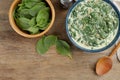 Tasty spinach dip on  table, flat lay Royalty Free Stock Photo