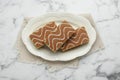 Tasty sponge cakes on white marble table, top view Royalty Free Stock Photo