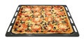 Tasty square pizza with vegetables on a baking pan