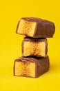 Tasty Stacked Chocolate Honeycomb Treat on yellow background