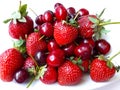 Tasty strawberries and cherries on white background Royalty Free Stock Photo