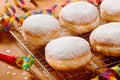 Tasty Sugared Round Donuts on Table