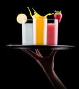 Tasty summer fruit drinks with splash on tray Royalty Free Stock Photo