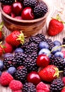 Tasty summer fruits on a wooden table Royalty Free Stock Photo