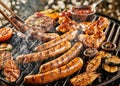 Tasty summer picnic with grilling food on a BBQ Royalty Free Stock Photo